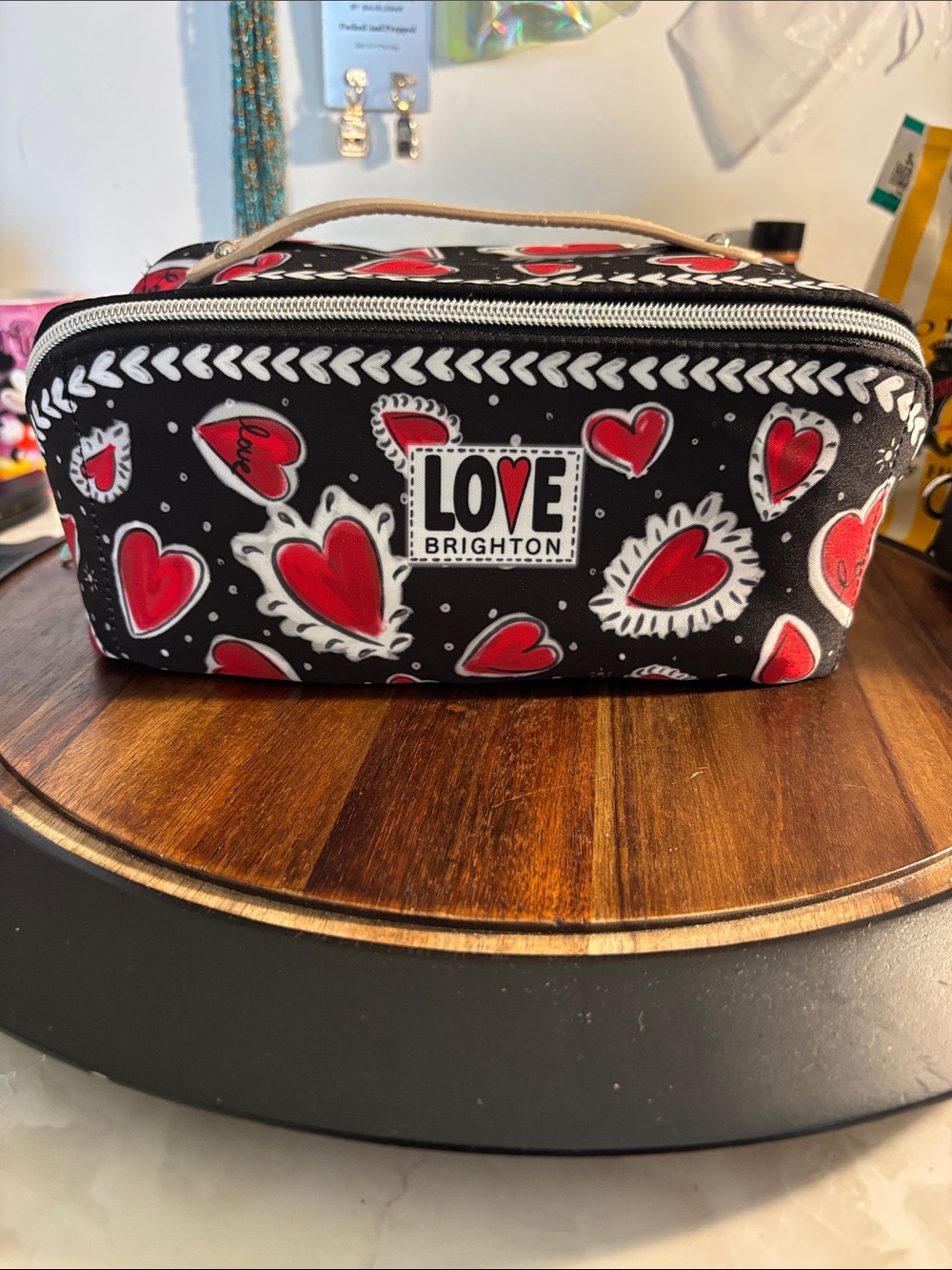 Brighton A Flutter Cosmetics Bag in black canvas with red hearts